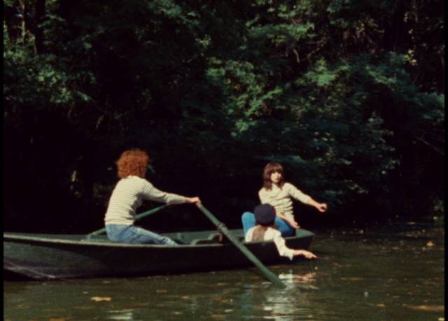 Celine (Juliet Berto) and Julie (Dominique Labourier) take the rescued Madlyn (Nathalie Asnar) boating in Celine and Julie Go Boating (1974)