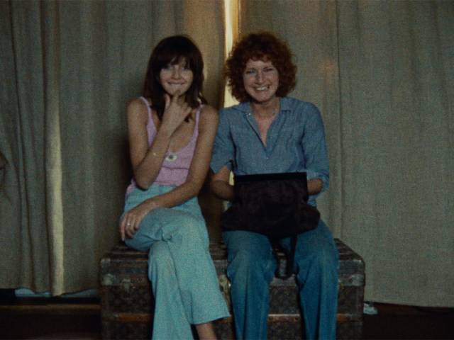 Celine (Juliet Berto) and Julie (Dominique Labourier) watch the unfolding melodrama like a movie which they can't take seriously in Jacques Rivette's Celine and Julie Go Boating (1974)