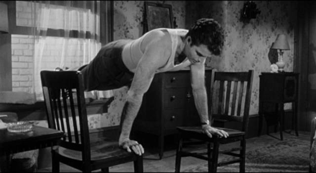 Claude (Vince Edwards) keeps fit as he waits for his next job in Irving Lerner's Murder by Contract (1958)