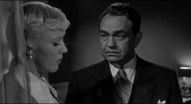 Prosecutor Lloyd Hallett (Edward G. Robinson) tries to awaken Sherry Conley (Ginger Rogers)'s sense of social responsibility in Phil Karlson's Tight Spot (1955)