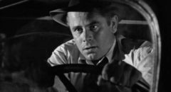 Unemployed engineer Mike Lambert (Glenn Ford) loses his brakes driving down a mountain in Richard Wallace's Framed (1947)