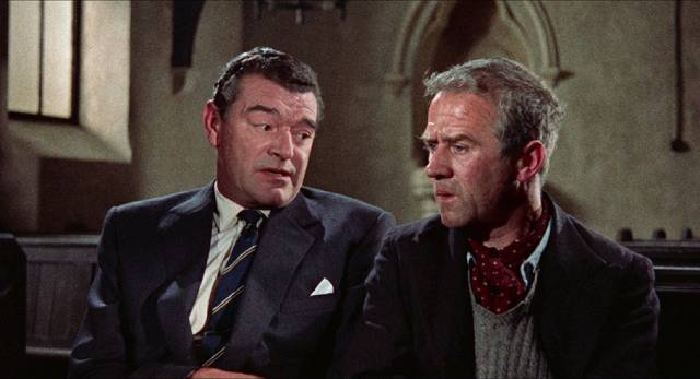 Gideon (Jack Hawkins) chats with petty criminal and informer "Birdie" Sparrow (Cyril Cusack) in John Ford's Gideon's Day (1958)