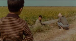 Inspector Park Doo-man (Song Kang-ho) encounters horror on a quiet summer day in Bong Joon-ho's Memories of Murder (2003)