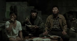 A pause in the interrogation of Baek Kwang-ho (Park No-shik) in Bong Joon-ho's Memories of Murder (2003)