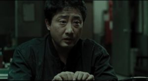 The investigation exposes Jo Byung-soon (Ryu Tae-ho)'s shameful secret in Bong Joon-ho's Memories of Murder (2003)