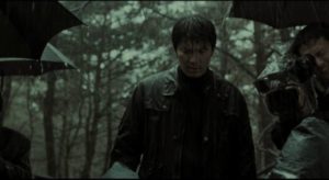 Inspector Seo Tae-yoon (Kim Sang-kyung) confronts the horror of a new murder for which he feels personally responsible in Bong Joon-ho's Memories of Murder (2003)