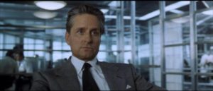 Nicholas Van Orton (Michael Douglas) listens impatiently to the corporate pitch in David Fincher's The Game (1997)