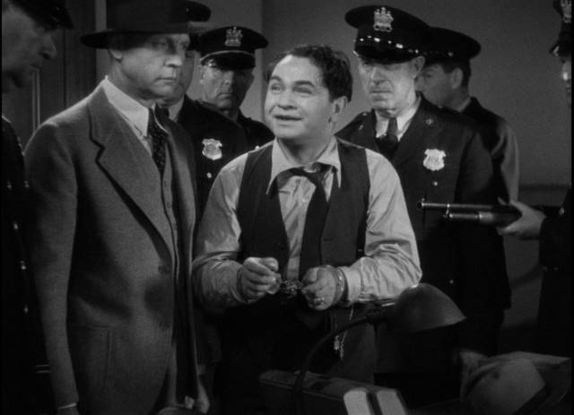 The police, mistaking him for “Killer” Mannion, try to force a confession out of Arthur (Edward G. Robinson) in John Ford's The Whole Town's Talking (1935)