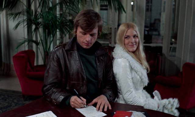 Stefan (John Karlen) and his naive bride Valerie (Danielle Ouimet) check in at the empty hotel in Harry Kümel’s Daughters of Darkness (1971)