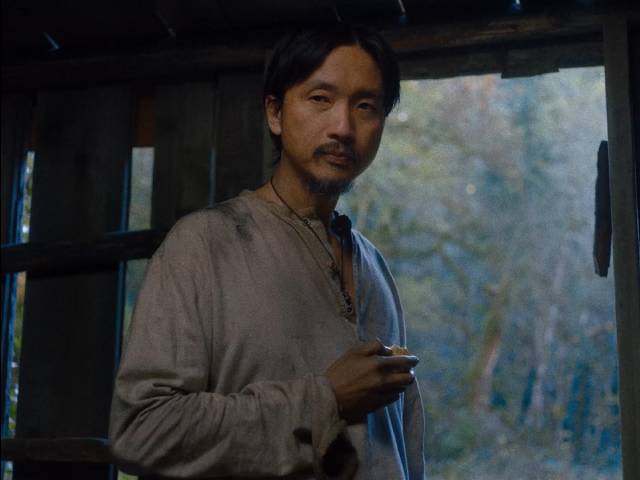 King Lu (Orion Lee) establishes a domestic space in Kelly Reichardt's First Cow (2020)