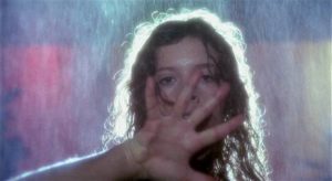 A victim seen through the eyes of the killer in Lucio Fulci's Murder-Rock: Dancing Death (1984)