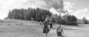 Jewish prisoners try to flee the train taking them to a death camp in Václav Marhoul’s The Painted Bird (2019)