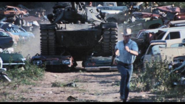The would-be thieves commandeer a tank for some climactic havoc in Bill Rebane's Twister's Revenge (1988)