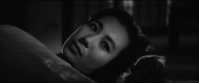 Michiko (Michiyo Aratama) is kept at a distance by Kaji (Tetsuya Nakadai) in Masaki Kobayashi's The Human Condition (1959-61)