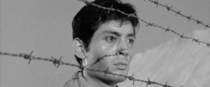 Kaji (Tetsuya Nakadai), as much a prisoner as the labourers he supervises in Masaki Kobayashi's The Human Condition (1959-61)