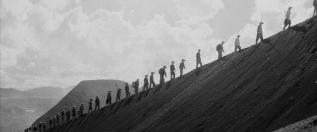 Chinese slave labourers dig for ore with their bare hands in Masaki Kobayashi's The Human Condition (1959-61)