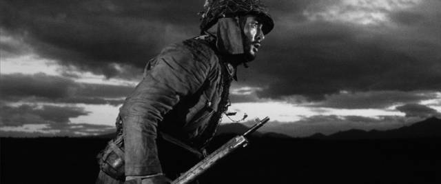 Forced by circumstance, Kaji (Tetsuya Nakadai) becomes a soldier despite his beliefs in Masaki Kobayashi's The Human Condition (1959-61)