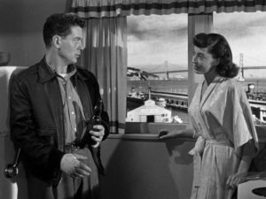 Edward Miller (Arthur Franz) misreads the friendliness of Jean Darr (Marie Windsor) in Edward Dmytryk's The Sniper (1952)