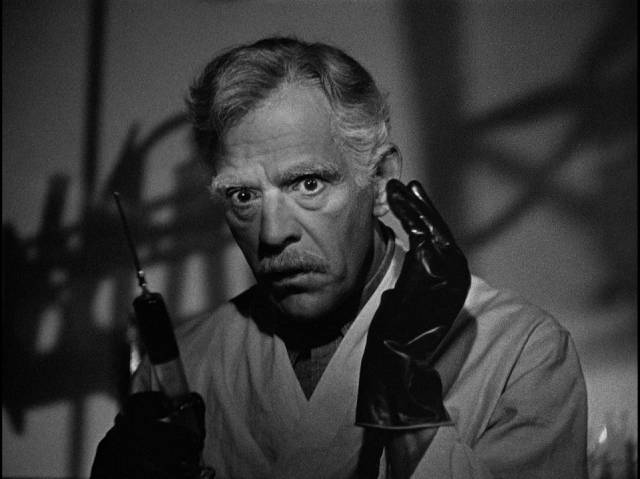 Dr. John Garth (Boris Karloff) is distracted by a murderer's impulses in Nick Grinde's Before I Hang (1940)