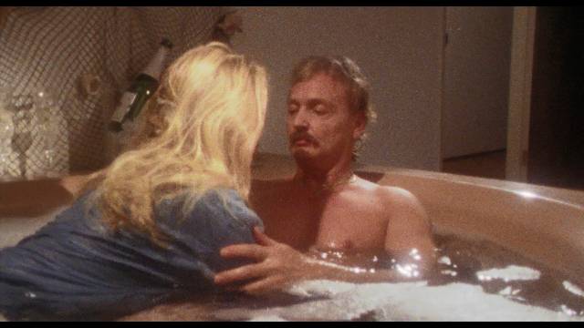 Writer-director-star John De Hart gives himself an opportunity to get naked in Champagne and Bullets (1993)
