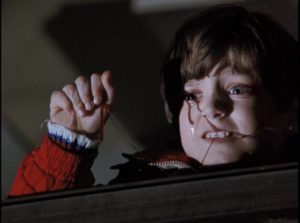 Young Elijah Wood watches as his father is murdered in Mike Robe's Child in the Night (1990)