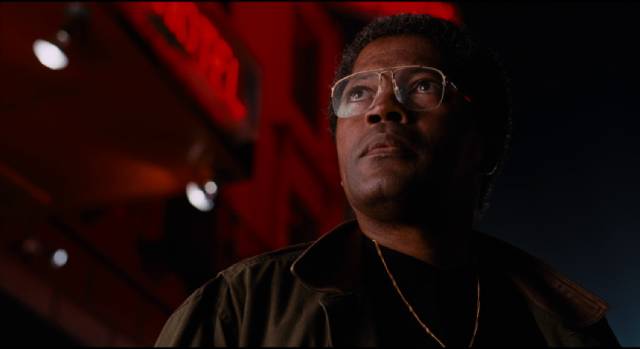 Detective Taft (Clarence Williams III) takes an interest in Russell (Laurence Fishburne) in Bill Duke's Deep Cover (1992)