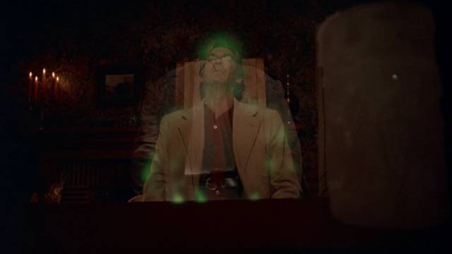 Medium Dr. Carl Farnsworth (David Warner) channels a hostile spirit in Donald P. Borchers' Grave Secrets (1989)