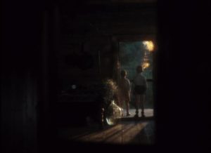 A glimpse in the mirror of young Alexei and his sister watching the barn burn in Andrei Tarkovsky's Mirror (1975)