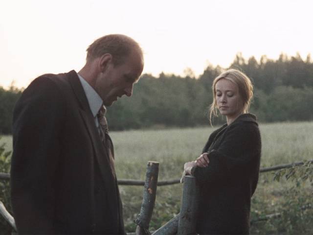 The mother is annoyed by the doctor (Anatoly Solonitsyn)'s visit in Andrei Tarkovsky's Mirror (1975)