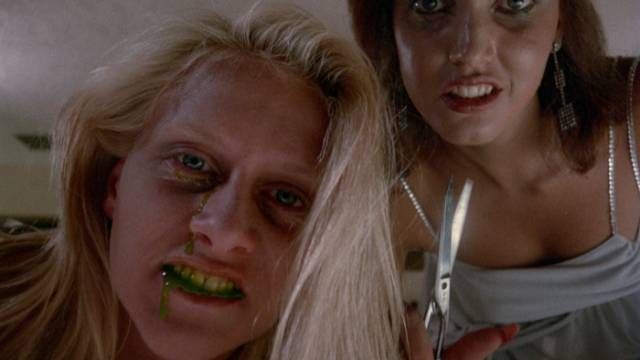 The experiments result in slime-spitting murderous zombies in Henri Sala's Nightmare Weekend (1985)