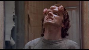Mr. Staziak (Steve Parrish) loses control of his telekinetic powers in Pierre David's Scanner Cop (1993)