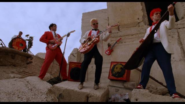 Among Buddy's rivals in Lance Mungia's Six String Samurai (1998) are The Red Elvises ...