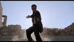 Kung-fu musician Buddy (Jeffrey Falcon) fights his way across the desert in Lance Mungia's Six String Samurai (1998)