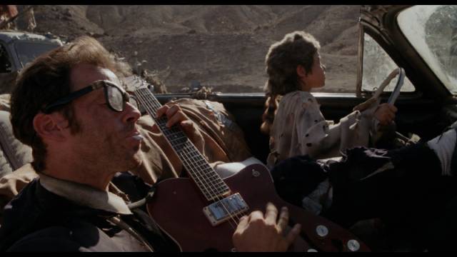 The Kid (Justin McGuire) proves helpful on the journey in Lance Mungia's Six String Samurai (1998)