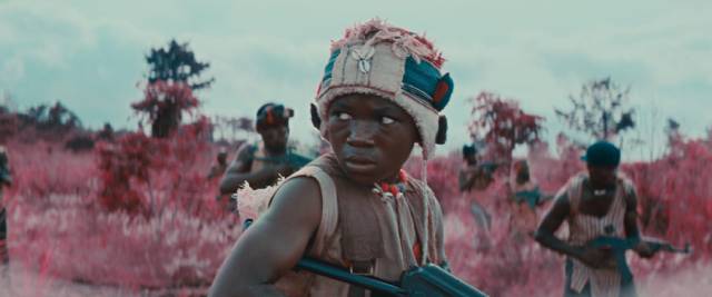 Agu (Abraham Attah) hallucinates as he goes into battle in Cary Joji Fukunaga’s Beasts of No Nation (2015)