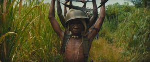 Following the collapse of the Commandant (Idris Elba)'s battalion, Agu (Abraham Attah) surrenders to UN troops in Cary Joji Fukunaga’s Beasts of No Nation (2015)