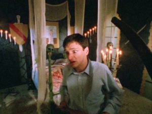 Warren (John Hawkes) has trouble distinguishing real blood from fake gore in Daniel Erickson's Scary Movie (1991)