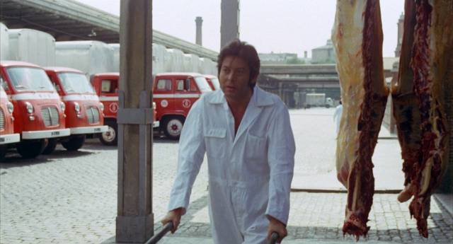 Working in a slaughterhouse has deadened Marcos (Vicente Parra)'s feelings in Eloy de la Iglesia's The Cannibal Man (1972)