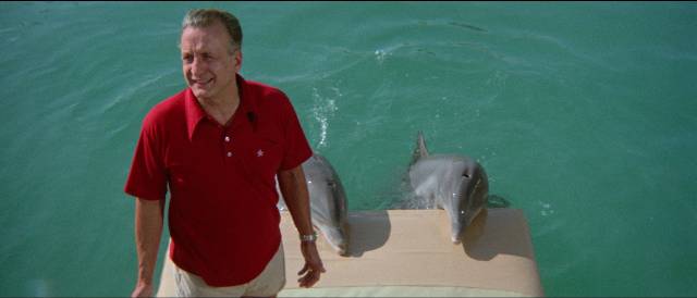 Jake Terrell (George C. Scott) introduces his friends in Mike Nichols' The Day of the Dolphin (1973)