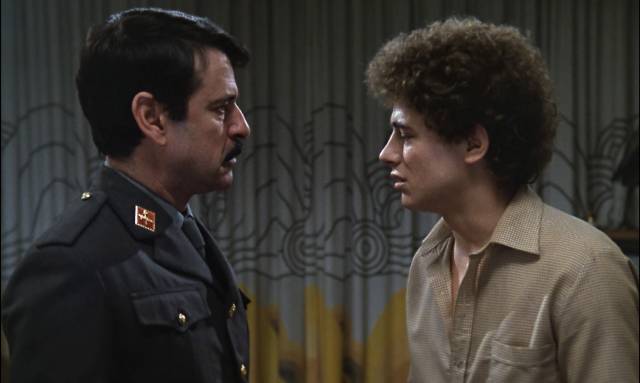 Commander Evaristo Torrecuadrada (Jose Manuel Cervino) discovers that his son Paco (Jose Luis Manzano) is a drug addict in Eloy de la Iglesia's El Pico (1983)