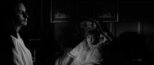 Janet (Jennie Linden) wakes to see the silent woman in white (Clytie Jessop) standing by her bed in Freddie Francis Nightmare (1964)