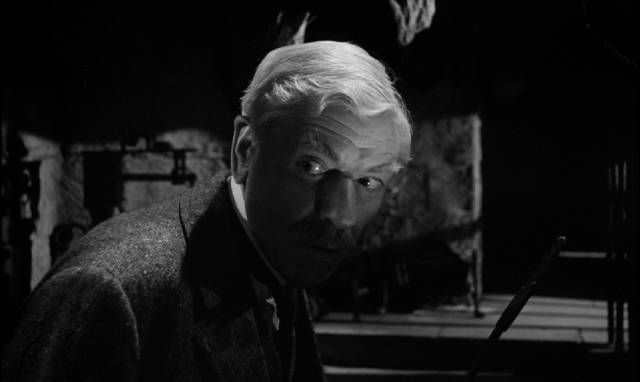 Scheming Walter Venable (Andre Morell) is haunted by his murdered wife's cat in John Gilling's The Shadow of the Cat (1961)