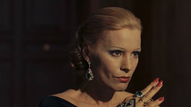 Baroness Sophie (Ingrid Thulin) schemes with her lover to take control of the family business in Luchino Visconti's The Damned (1969)