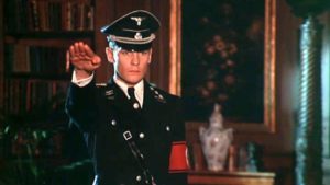 Martin (Helmut Berger)'s madness reaches its inevitable endpoint: as a dedicated SS officer serving the Reich in Luchino Visconti's The Damned (1969)