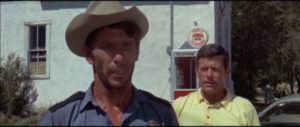Local sheriff L.Q. Jones doesn't take kindly to strangers in town in Bernard McEveety's The Brotherhood of Satan (1970)