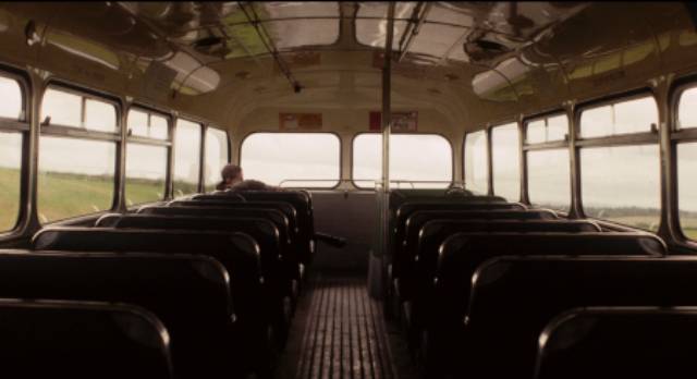 James (William Eadie) takes a bus out of the city and discovers a half-built housing development in open country in Lynne Ramsay's Ratcatcher (1999)