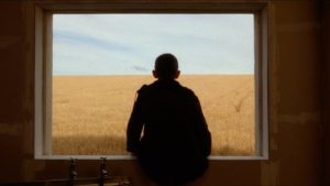 James (William Eadie) takes a bus out of the city and discovers a half-built housing development in open country in Lynne Ramsay's Ratcatcher (1999)