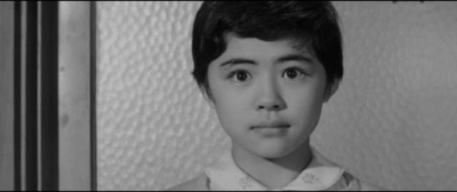 10-year-old Sayuri (Yachie Matsui) finds herself in a nightmarish family in Noriaki Yuasa's The Snake Girl and the Silver-Haired Witch (1968)