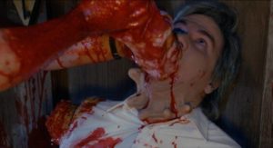 A tourist is choked with his own severed arm in Somtow Sucharitkul's The Laughing Dead (1989)