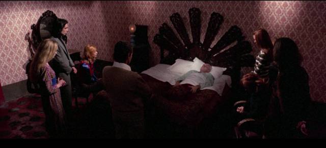 The family gather around patriarch Sir Thomas Hilton (Simone Santo) as he lies dying in Angelo Pannaccio’s Sex of the Witch (Il sesso della strega, 1973)